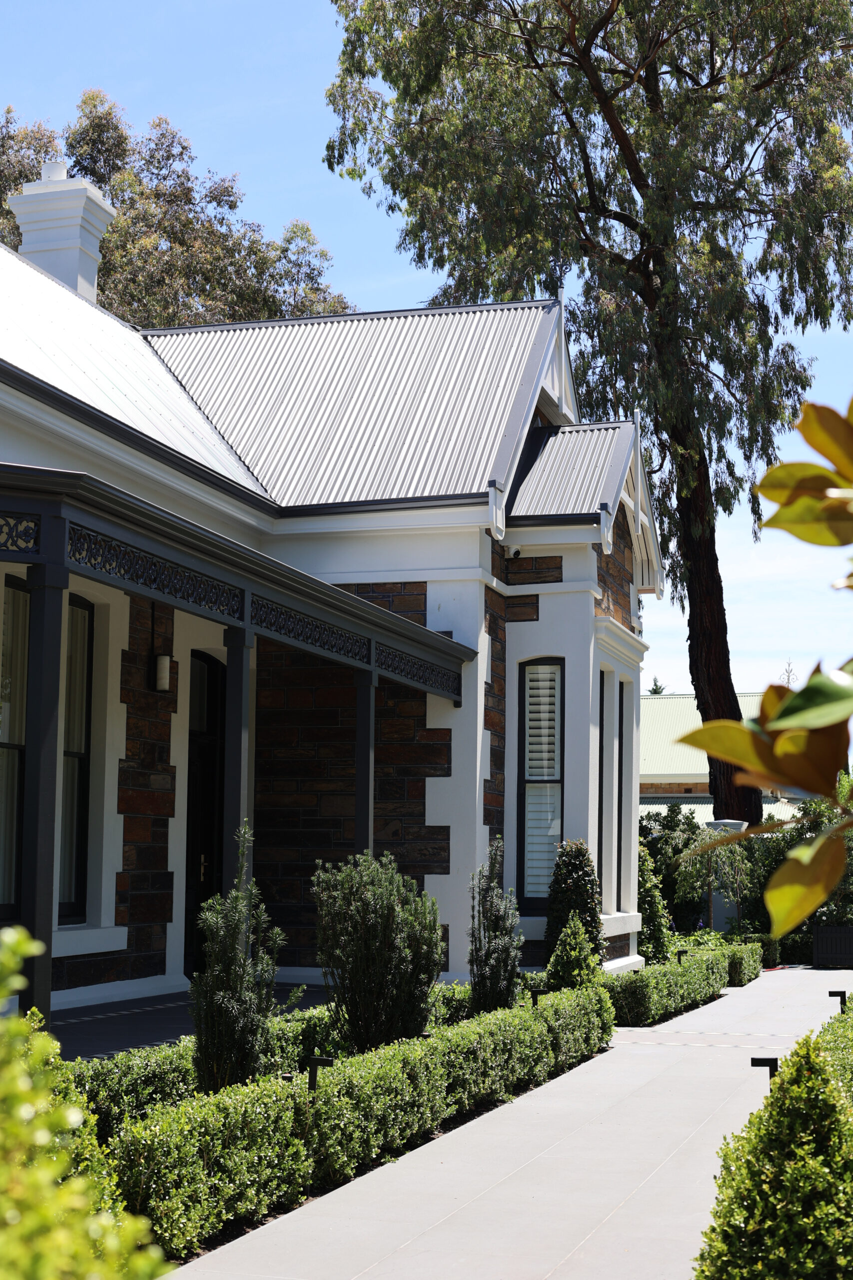 Sleek Colorbond Roofing Finish Side view of Colorbond roofing on home