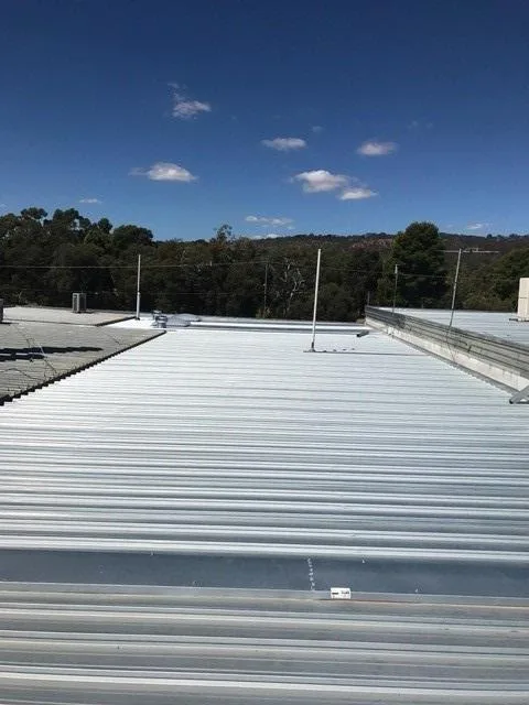 Metal Roofs with High Pitch High-pitched metal roofs on a house